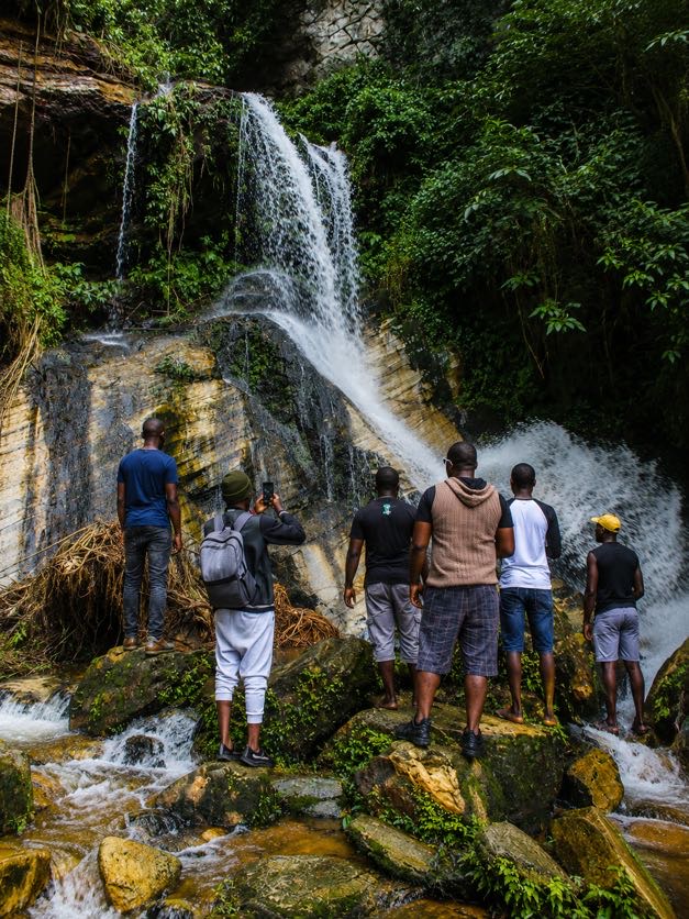Visitors watching the cascading Arinta Waterfalls
